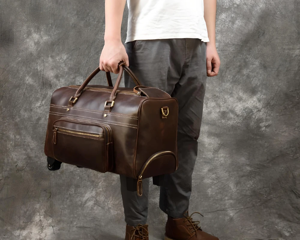 leather rolling carry on bag