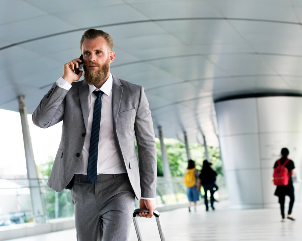 leather rolling carry on bag